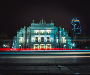 Light trails of passing cars in front of Yekaterinburg Academic Opera and Ballet Theatre
