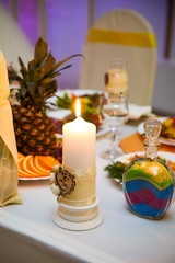 wedding background: wedding candle on the festive table
