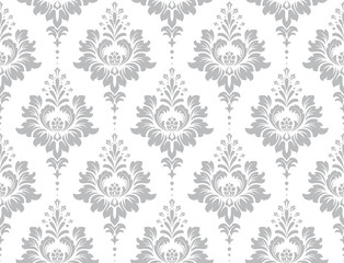 Fototapeta premium Wallpaper in the style of Baroque. Seamless vector background. White and grey floral ornament. Graphic pattern for fabric, wallpaper, packaging. Ornate Damask flower ornament.
