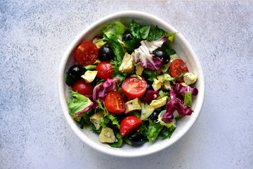 Vegetable salad with grilled chicken. Top view with copy space.