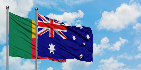 Benin and Australia flag waving in the wind against white cloudy blue sky together. Diplomacy concept, international relations.