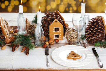 Christmas table setting with gingerbread. Holiday decoration