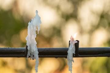 Candle burning and melting with beautiful  background