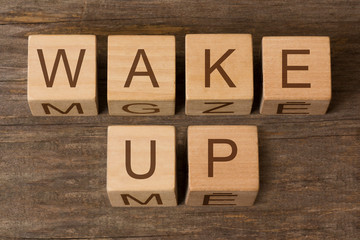 Wake Up text on wooden toy cubes