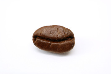 Fototapeta premium Closeup a Roasted Arabica Coffee Bean Isolated on White Background