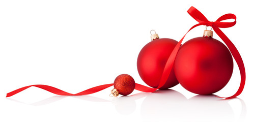 Three red Christmas baubles with ribbon bow isolated on white background