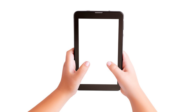 Top view closeup on hands of boy holding a black tablet PC with a blank white screen for text or pictures isolated on a white background. Mobile games, web pages, child safety on the internet concept