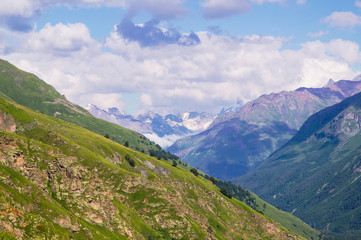 Fototapeta na wymiar Mountain landscape. Elbrus region, Elbrus, mountains in the summer. Mountains of the Greater Caucasus from Mount Elbrus