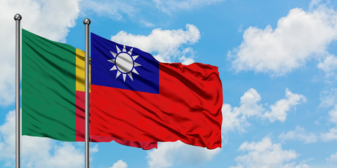 Benin and Taiwan flag waving in the wind against white cloudy blue sky together. Diplomacy concept,...