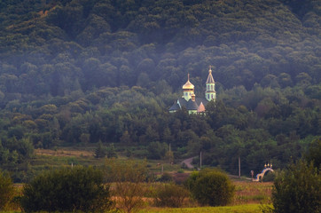 Orthodox monastery in a forest valley. Natural landscape. Transcarpathia Ukraine