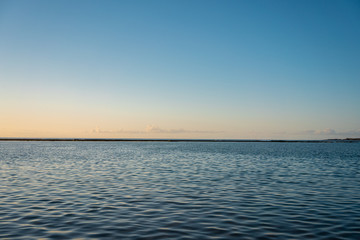 Calm sea at sunset