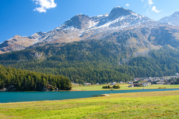 Sankt Moritz turquise lake and big mountains in summer, Switzerland