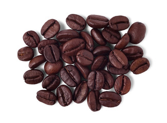 Pile of roasted coffee beans isolated on white background. Top view.