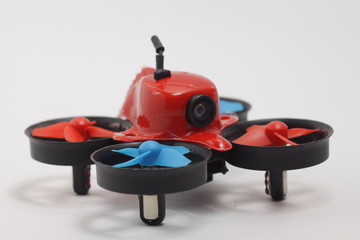 Red little quadcopter toy