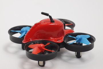 Red little quadcopter toy