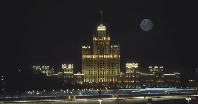  view of the night promenade of Moscow. Full moon in dark sky