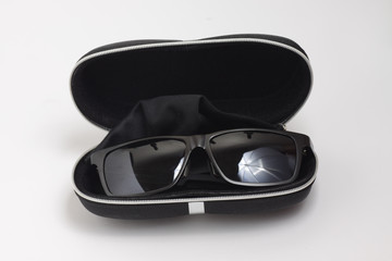 Black sunglasses on a white background