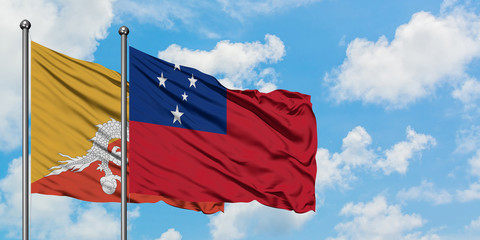 Bhutan and Samoa flag waving in the wind against white cloudy blue sky together. Diplomacy concept, international relations.