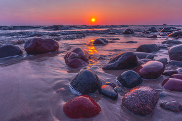 Obraz premium Baltic sea at beautiful sunrise light in Lithuania beach.