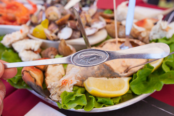 Lobster fork and portuguese seafood meal