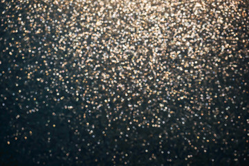 Dark blue glitter and gold lights bokeh abstract background. Holiday concept