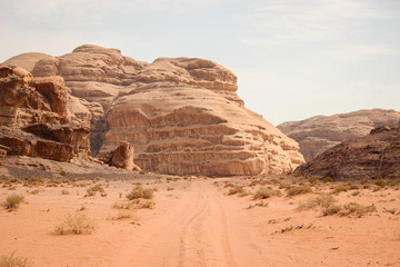 Fototapeta na wymiar Walking and hiking tours in the Wadi Rum desert, Jordan