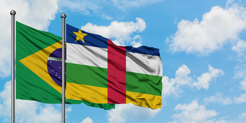 Brazil and Central African Republic flag waving in the wind against white cloudy blue sky together. Diplomacy concept, international relations.