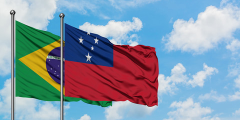 Brazil and Samoa flag waving in the wind against white cloudy blue sky together. Diplomacy concept, international relations.