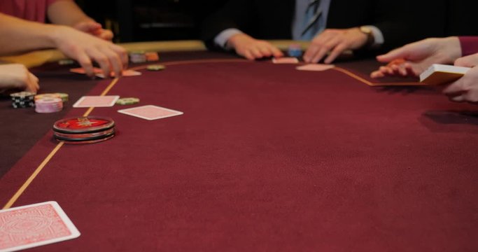 Dealer shuffles the poker cards