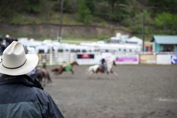 Cowboy rodeo spectator bokeh