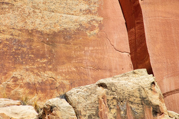Ancient Fremont People petroglyphs make present day visitor aware of their existence oin the sandstone walls of Capitol Reef National Park, Utan