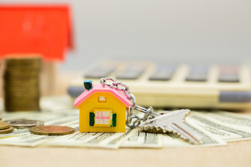 House on the coin is an investment saving concept.