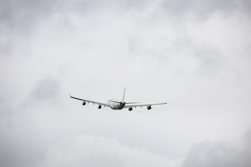 Fototapeta na wymiar Aircraft in the sky - departing airport