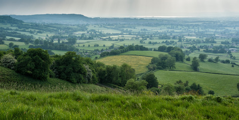 Fototapeta na wymiar Uley - View over Downham Hill viewed from Uley Bury, Cotswold Outliers near Dursley, Gloucestershire - England 