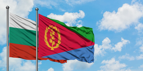Bulgaria and Eritrea flag waving in the wind against white cloudy blue sky together. Diplomacy concept, international relations.