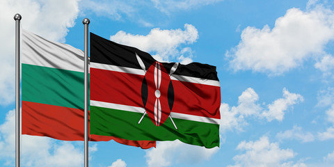 Bulgaria and Kenya flag waving in the wind against white cloudy blue sky together. Diplomacy concept, international relations.