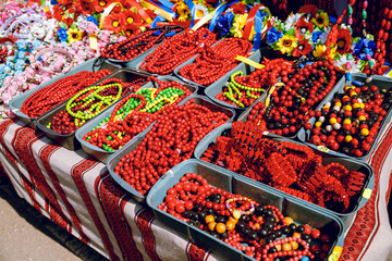 Red beads made of wood. Brightly.