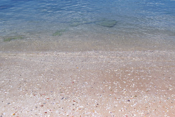 Aerial view of ocean waves and beautiful rocky coast at Rayong sea, Thailand