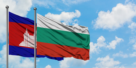 Cambodia and Bulgaria flag waving in the wind against white cloudy blue sky together. Diplomacy concept, international relations.