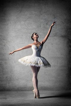 Ballet dancer, dancer, graceful lady, Ballerina on pointe in pose. Ballet, dance, theater, concert, pointe shoes.