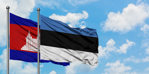 Cambodia and Estonia flag waving in the wind against white cloudy blue sky together. Diplomacy concept, international relations.