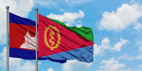 Cambodia and Eritrea flag waving in the wind against white cloudy blue sky together. Diplomacy concept, international relations.