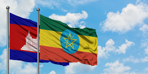 Cambodia and Ethiopia flag waving in the wind against white cloudy blue sky together. Diplomacy concept, international relations.