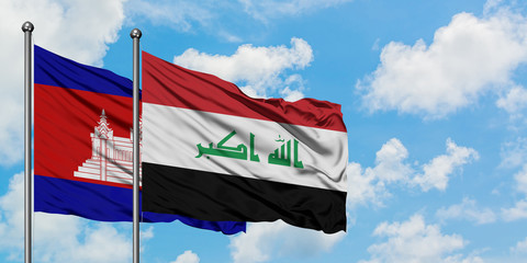Cambodia and Iraq flag waving in the wind against white cloudy blue sky together. Diplomacy concept, international relations.