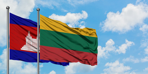 Cambodia and Lithuania flag waving in the wind against white cloudy blue sky together. Diplomacy concept, international relations.