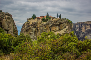 majestic European highland scenery landscape view in Greece of christian monastery on top of rock religion and sightseeing destination place for pilgrims and tourists 