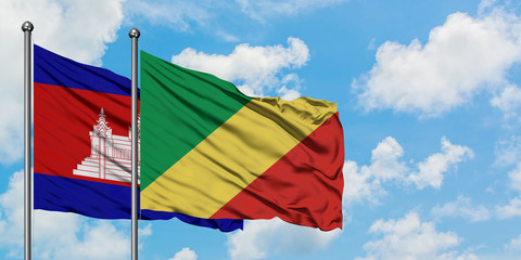 Cambodia and Republic Of The Congo flag waving in the wind against white cloudy blue sky together. Diplomacy concept, international relations.