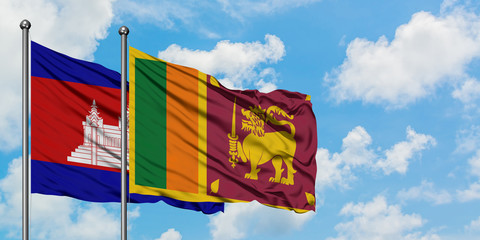 Cambodia and Sri Lanka flag waving in the wind against white cloudy blue sky together. Diplomacy concept, international relations.