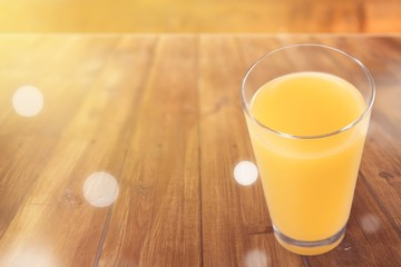 Orange juice and slices of orange on background