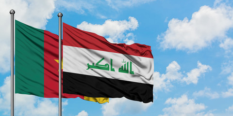 Cameroon and Iraq flag waving in the wind against white cloudy blue sky together. Diplomacy concept, international relations.